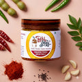 Green tamarind chilli pickle in a 200 g jar